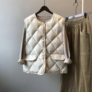 Gilet sans manches rembourré en duvet beige ultraléger pour femme deux poches à l'avant