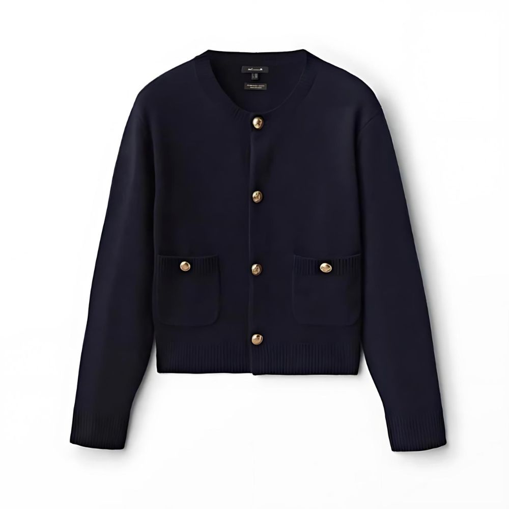 on voit sur un fond blanc un gilet bleu marine chaud et vintage pour femme